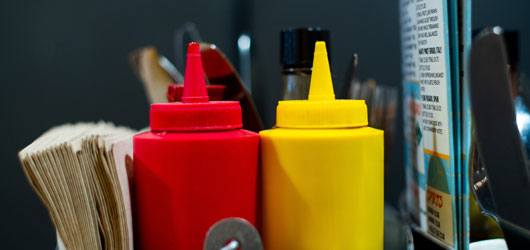 Ketchup and mustard bottles